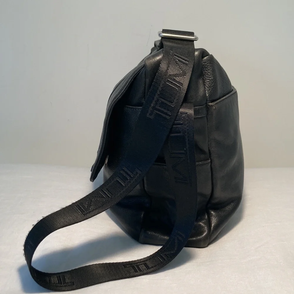 Tumi leather messenger tech lots of pockets